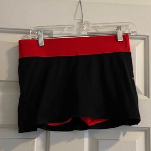 Nike tennis skirt with red shorts size small